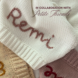 Hand-embroidered baby blanket in snow